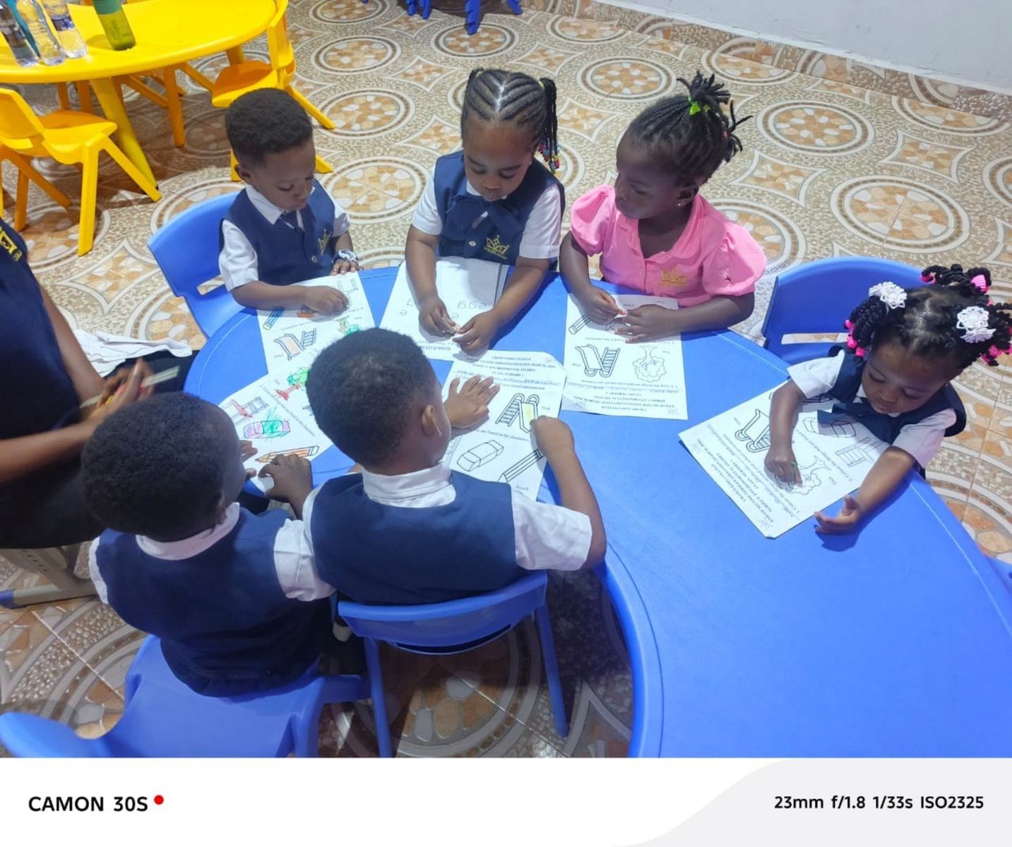 Crown Kids College children learning in class